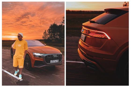 Евгений Фист и Audi Q8 на фоне заката 